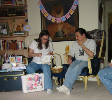Dani and James opening gifts
